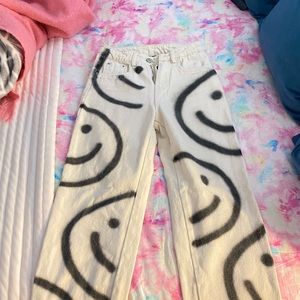 Smiley face jeans, size small